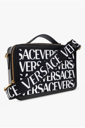 Versace embossed skull clutch bag