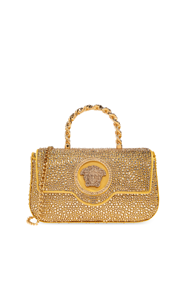 Handbag with shimmering crystals od Versace