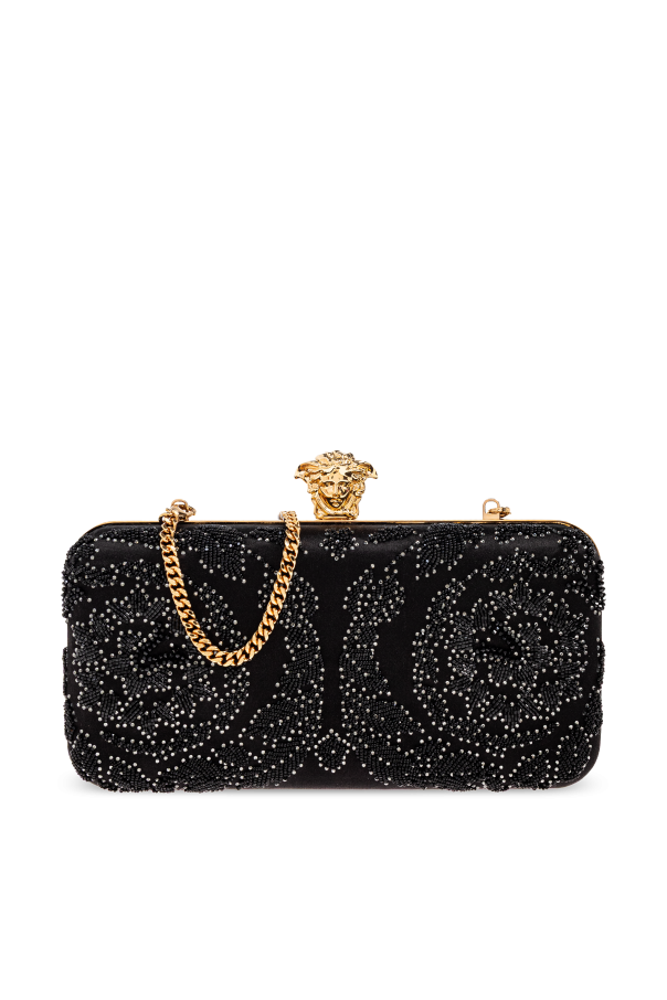 Clutch bag with shimmering embellishments od Versace