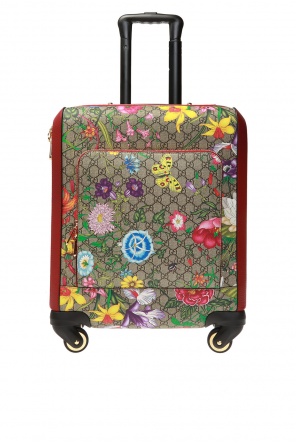 Patterned suitcase od Gucci