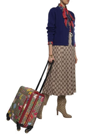 Patterned suitcase od Gucci