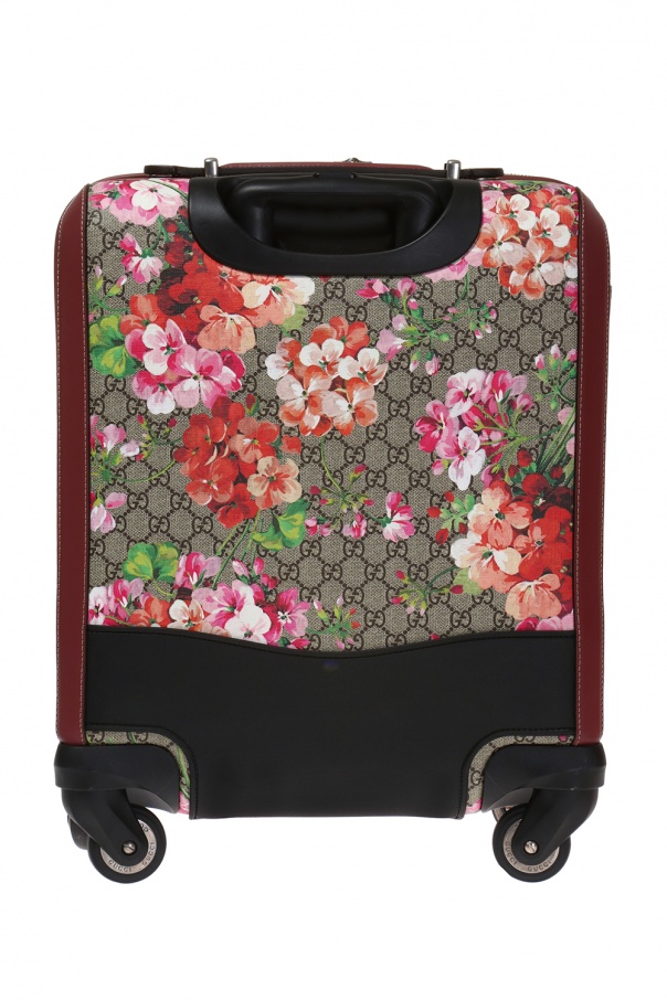 pink gucci suitcase