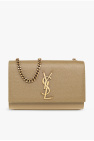 and Saint Laurent began manufacturing emblematic shoulder handbags that are still apparent today