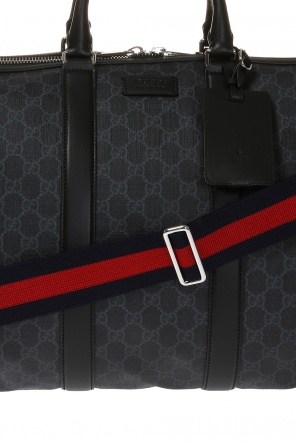 Gucci feather-trim ‘GG Supreme’ holdall bag