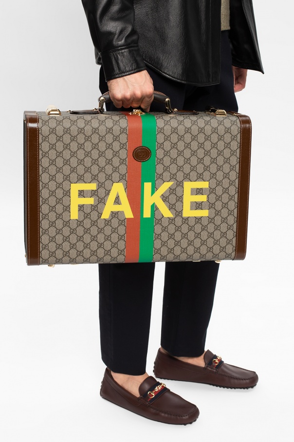 Gucci Suitcase with logo