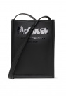 Alexander McQueen Women's Heel Tab Wedge Sole Sneakers in Black