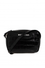 is a sleek yet deceptively spacious tote thats perfect for everyday use