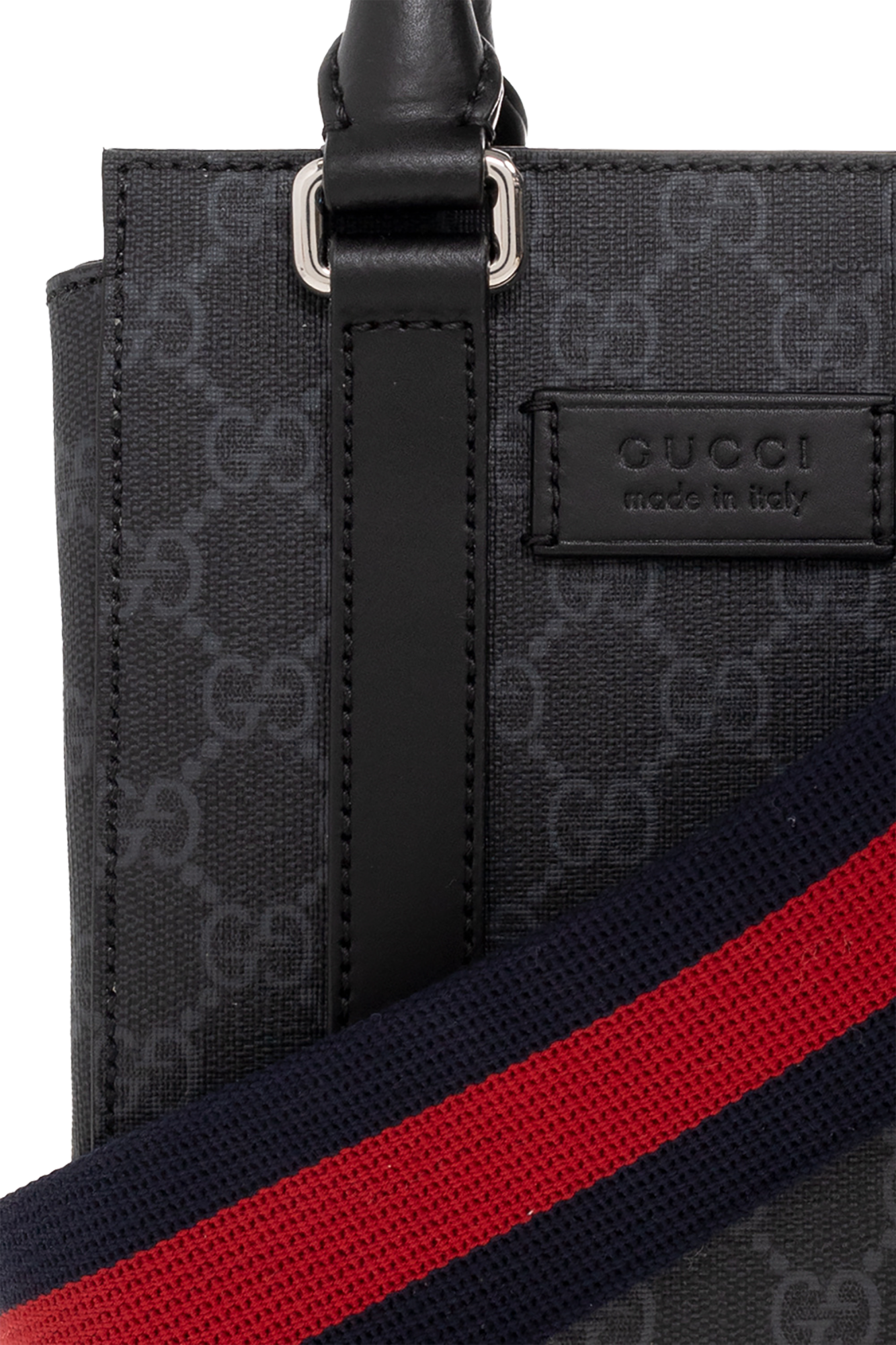 gucci wearing Monogrammed shoulder bag