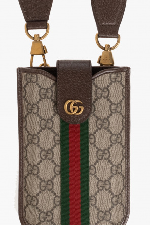 Gucci man With gucci wallets snake print wallet