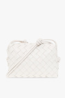 The A-lister accessorized with a quilted white handbag also from Bottega Veneta