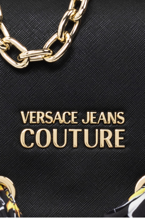 Versace Jeans Couture Margot Robbie Shines in Custom Chanel Dress & Hidden Heels at Golden Globes Red Carpet 2023