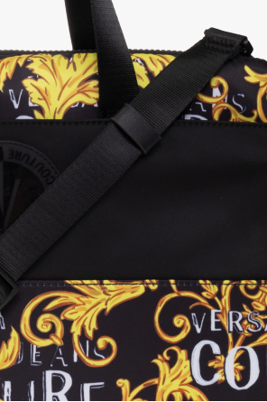 Versace Tapered-Max Jeans Couture Briefcase with ‘Logo Couture’ print