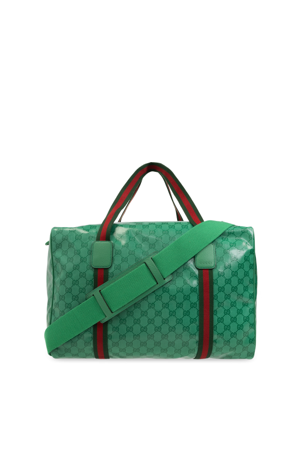 Holdall bag with embossed logo od Gucci
