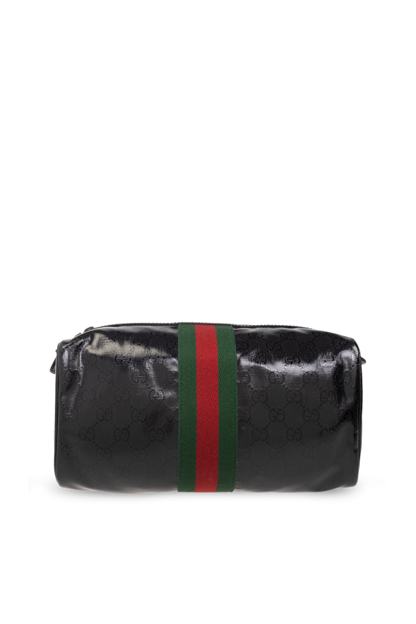 Wash bag with ‘Web’ stripe od Gucci