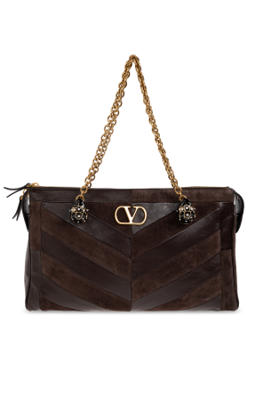 Leather bag with appliqués