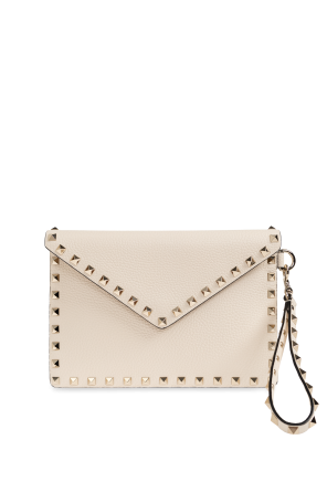 Cartera de mano de cuero con tachuelas