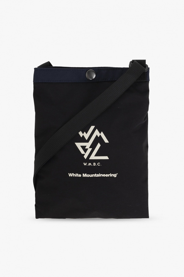 White Mountaineering White Mountaineering The Yokai Medal Blind logo Bag includes a range of medals that can be used with the Yo-Kai app