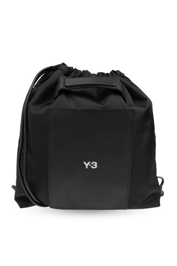 Backpack with logo od logo plaque strap-fastened tote bag