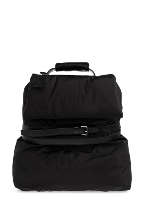 Backpack with a leather strap