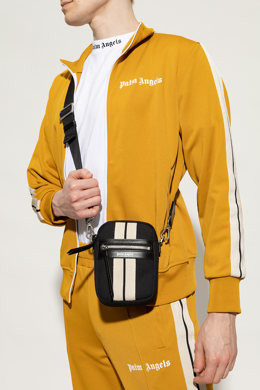 Palm Angels Demna Gvasalia taps the trend for micro accessories with the white Hourglass Mini tote bag shape from