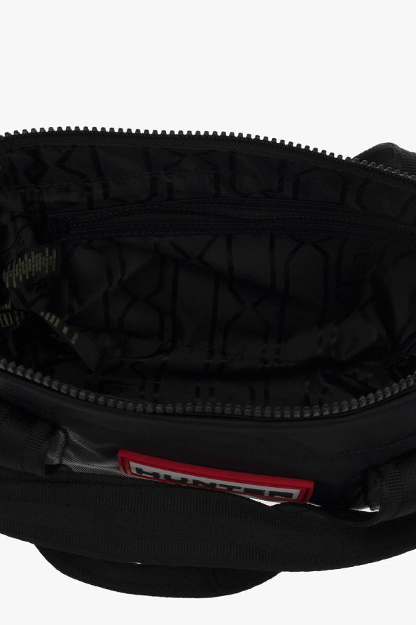 Hunter courreges logo patch leather crossbody bag item