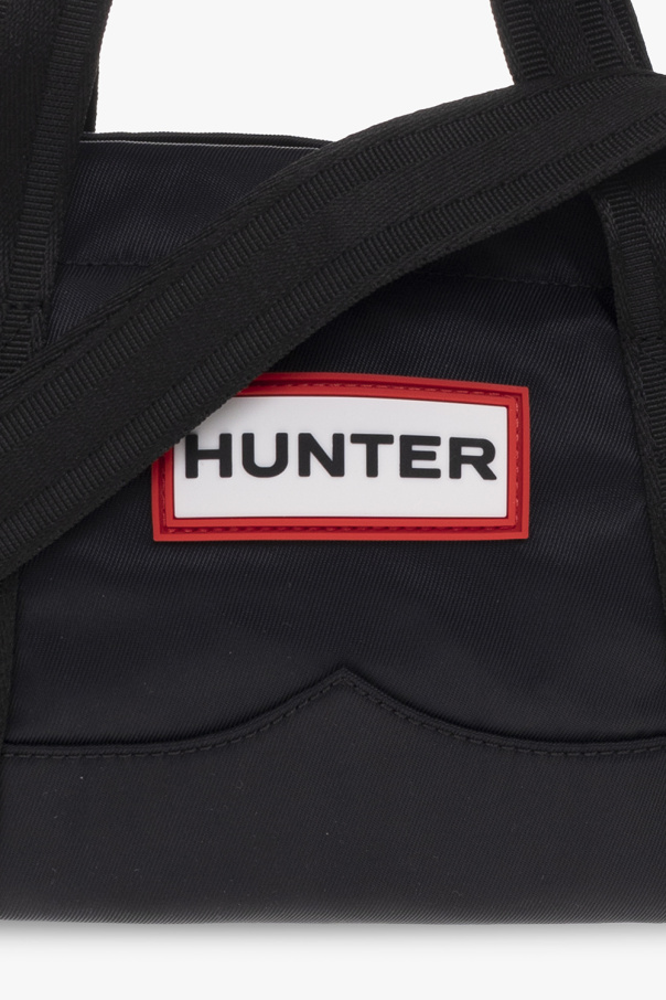 Hunter polka dot pattern flap crossbody bag