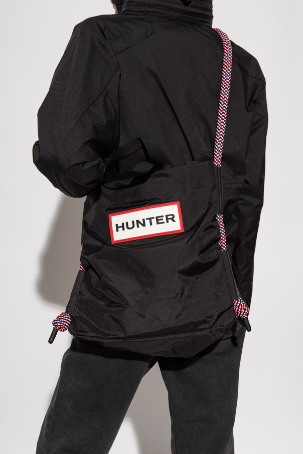 Hunter logo-print luggage bag