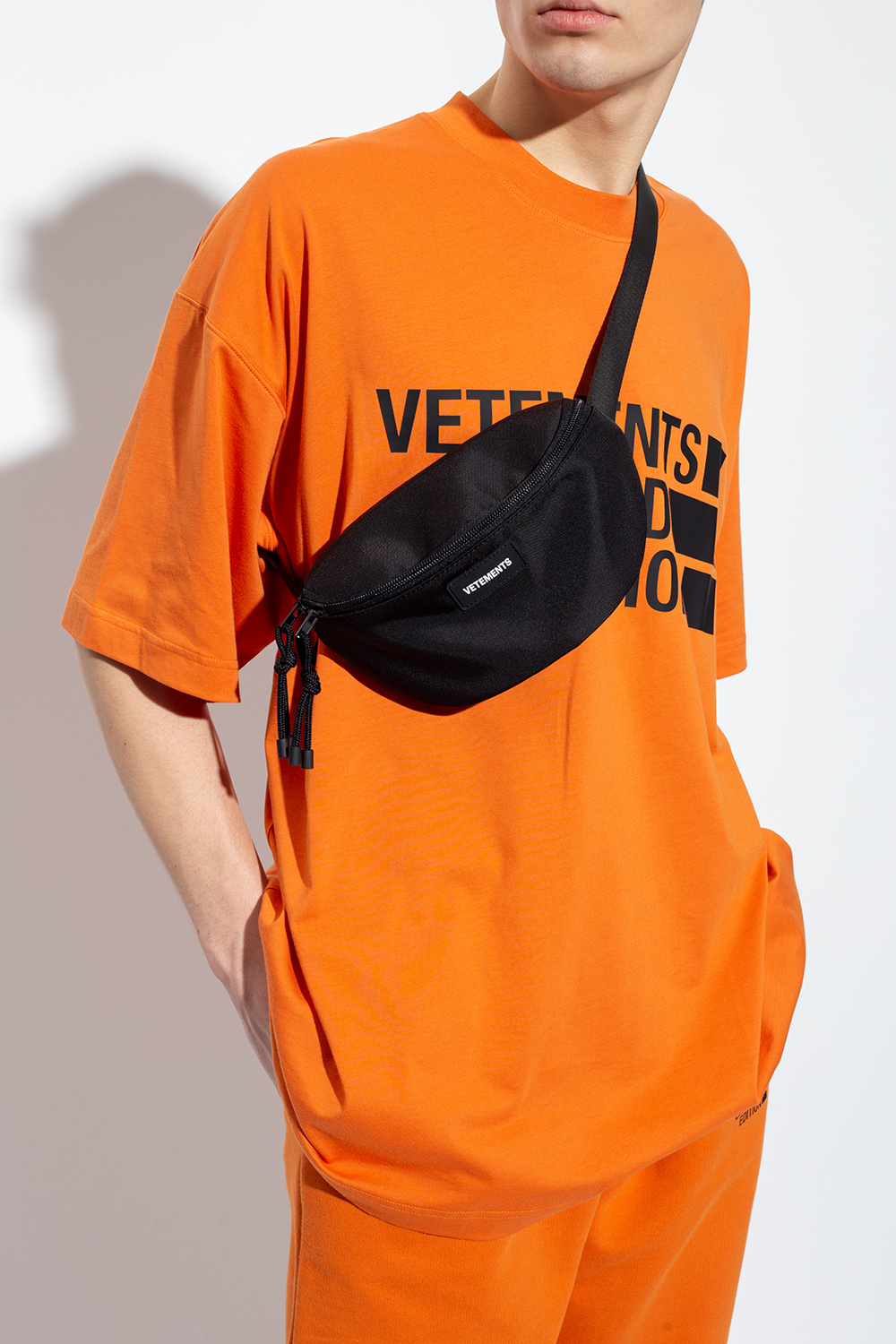 VETEMENTS this mens cotton waist bounds bag has large zippers for a retro effect