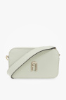 Lopez completed her look with a white Jason Stalvey mini bag and